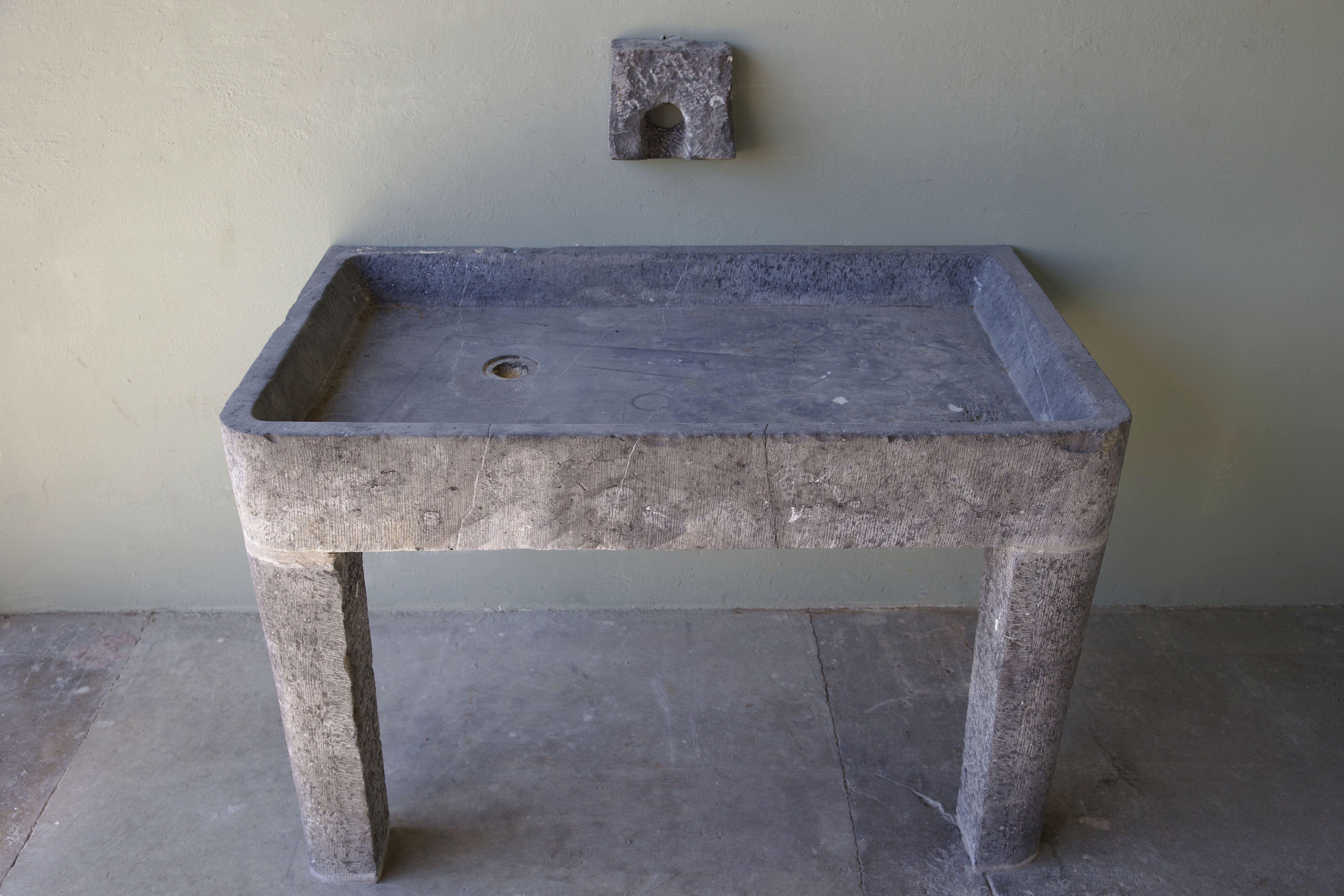 18th c. Belgian blue stone evier with legs from the working kitchen of a chateau  near Ghent, Belgium
